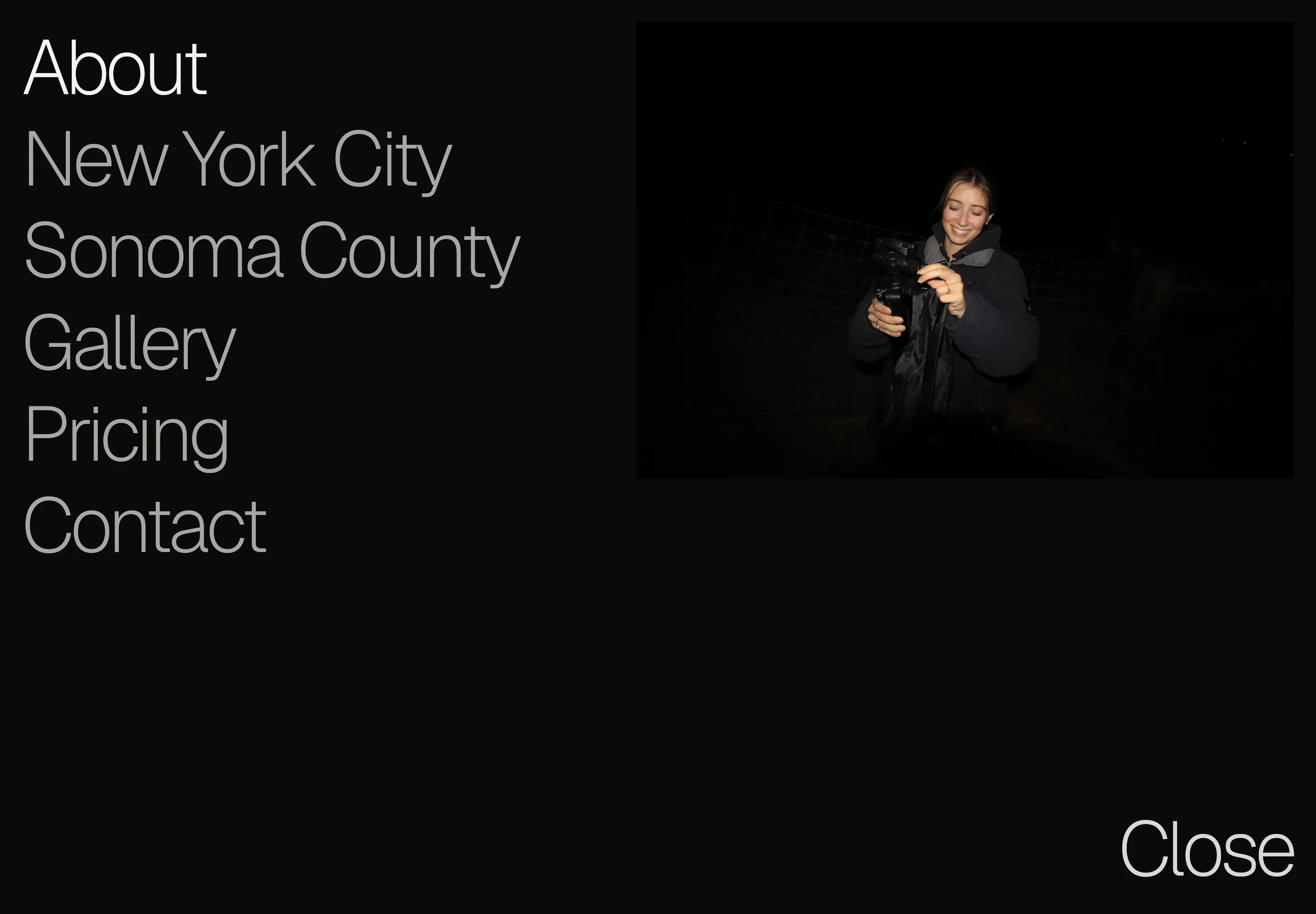 The full-screen menu pairs large navigation links with a photograph of Aleli holding a camera.